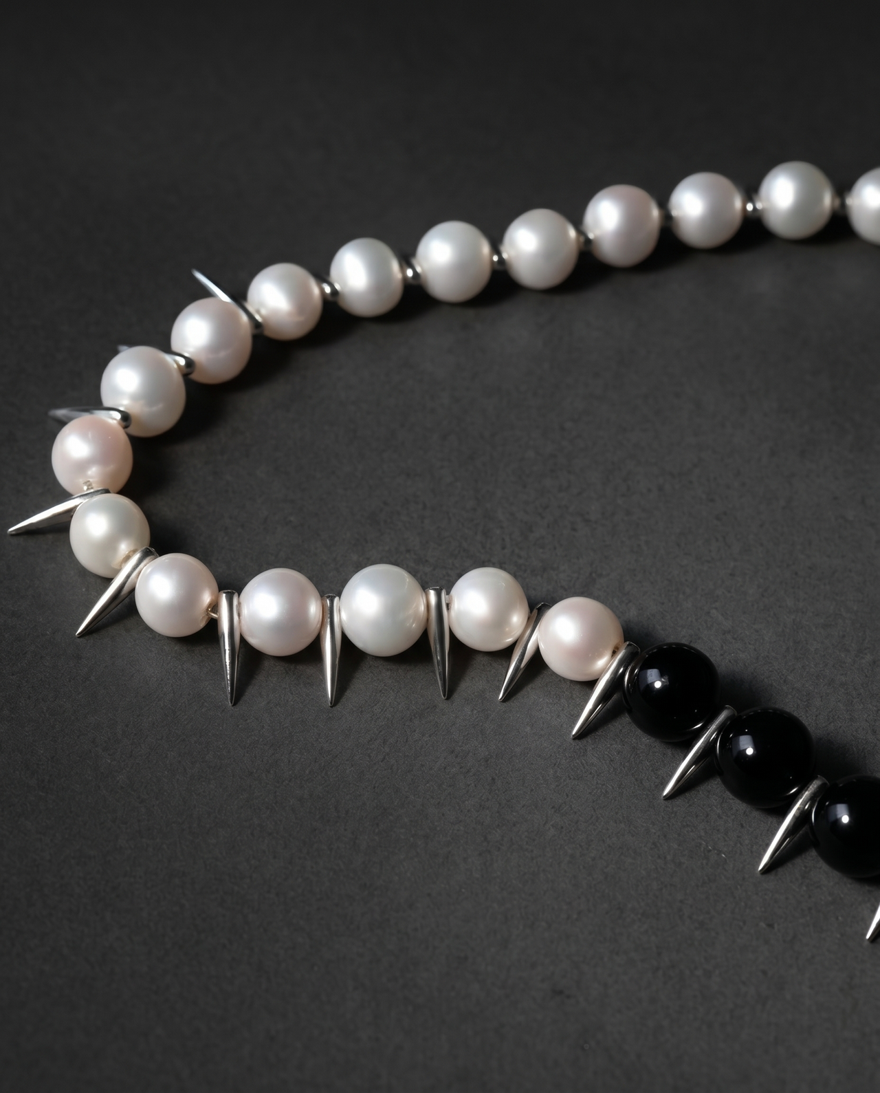 Pearl and black onyx beaded necklace with silver metal spikes