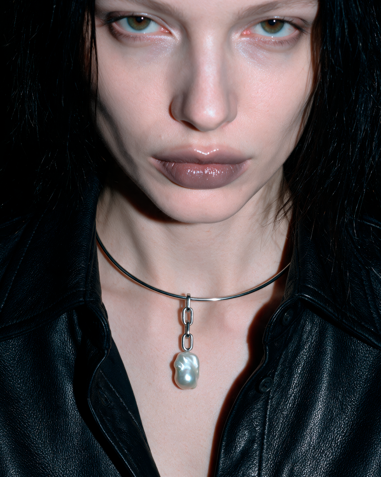 Single raw freshwater pearl on a thin metal choker